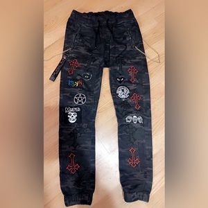 Patch pants, hand sown and fabric glued. Size small.